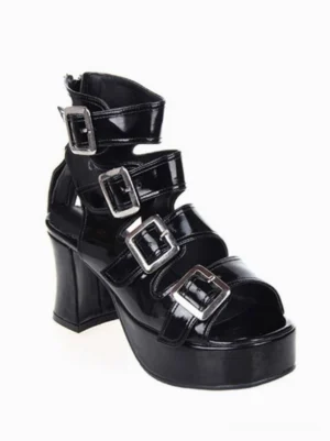 Black patent leather Lolita platform sandals showcasing cutout ankle design and thick platform sole, right front three-quarter view