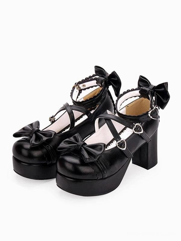 Black lolita platform shoes thick block heel heart-shaped buckles ankle and toe bows three-quarter front paired display