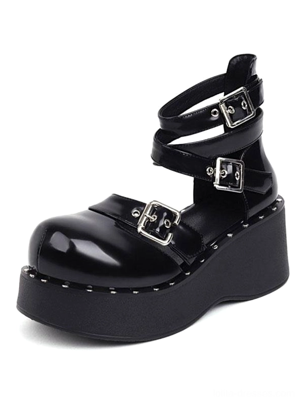 Academic lolita platform shoes black patent leather left three-quarter angle showing multiple buckle straps round toe thick platform sole