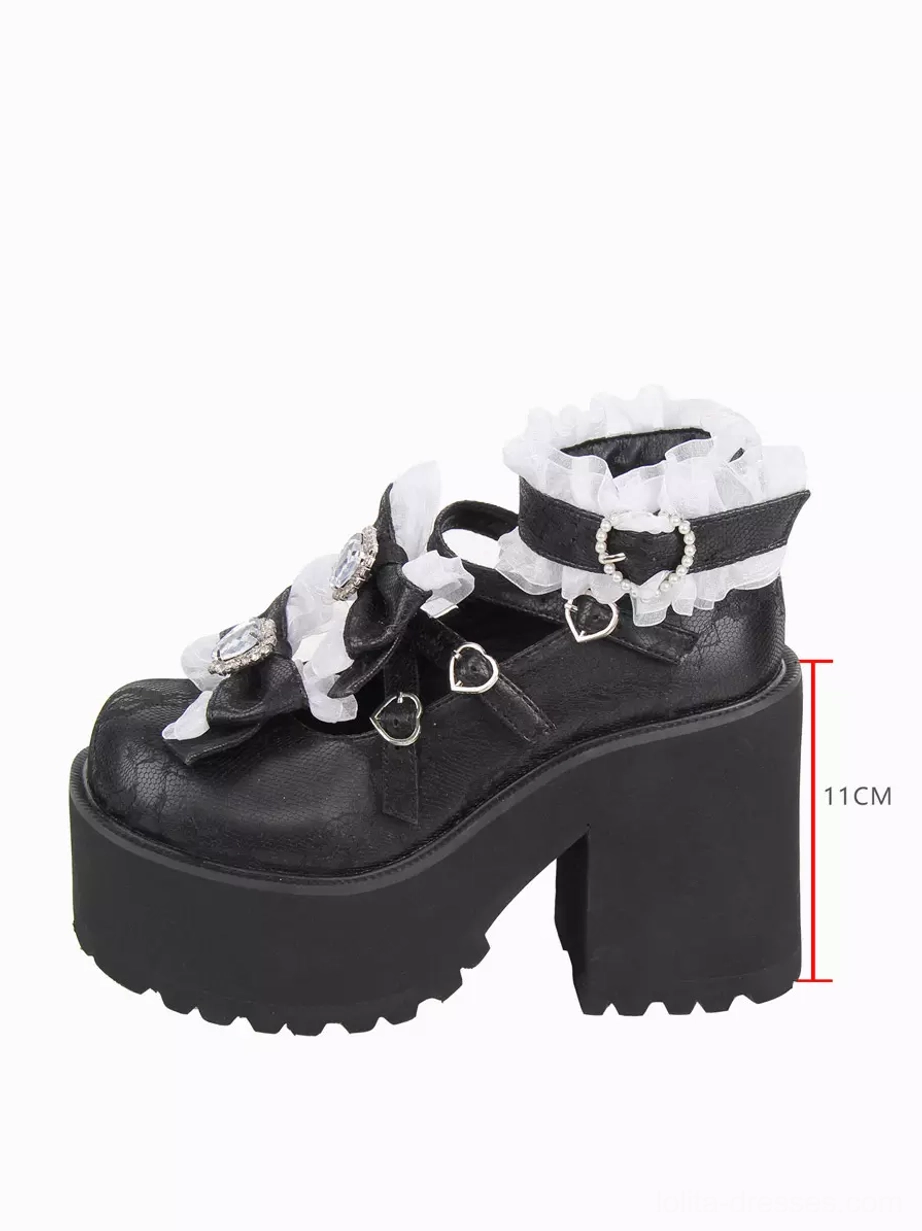 Side profile of black chunky heel lolita pumps showing 11cm heel height measurement and thick block platform construction with embossed PU leather
