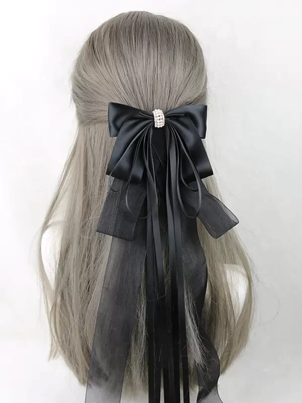 Black satin bow hair clip with rhinestone center decoration and mixed satin organza ribbons, lolita accessory displayed on mannequin back view