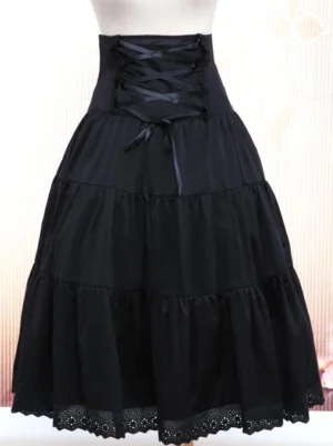 Black high-waist lolita skirt direct front view displaying center corset lace-up waist closure, structured high waistband, voluminous tiered gathered silhouette with decorative cutwork lace hemline trim