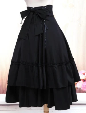 Classic Lolita black skirt displaying decorative metal eyelets on lace-up waist closure and side profile of tiered ruffled construction, showing elegant Gothic fashion details