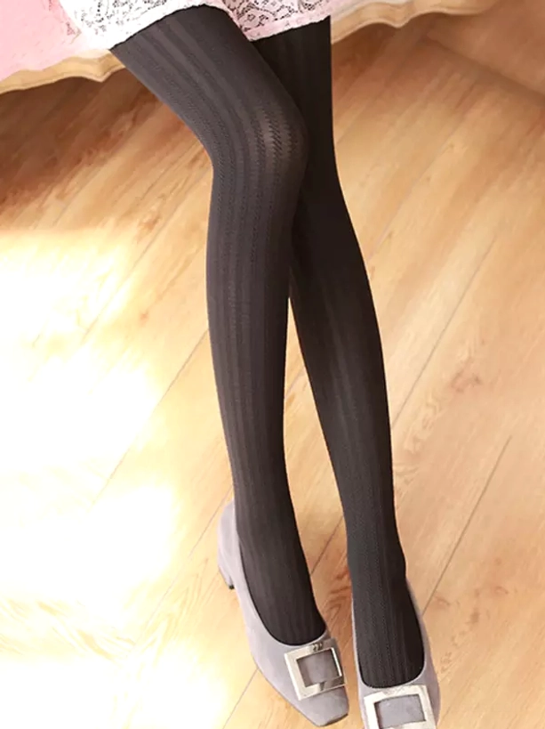 Black vertical stripe Lolita ribbed tights standing side view with lace skirt grey buckle flats