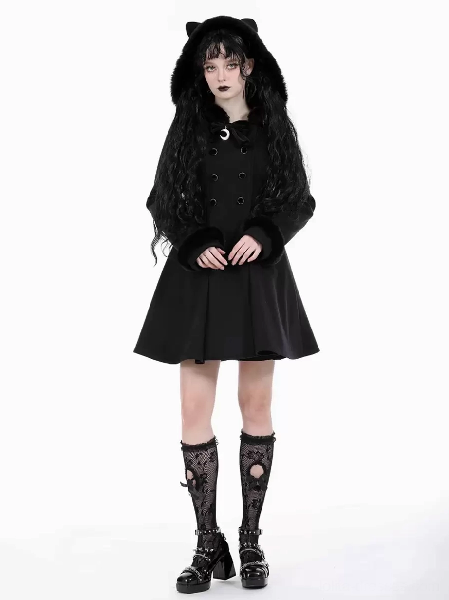 Black Lolita winter overcoat straight-on full-body view with crescent moon collar buckle and fitted waist on curly-haired female model