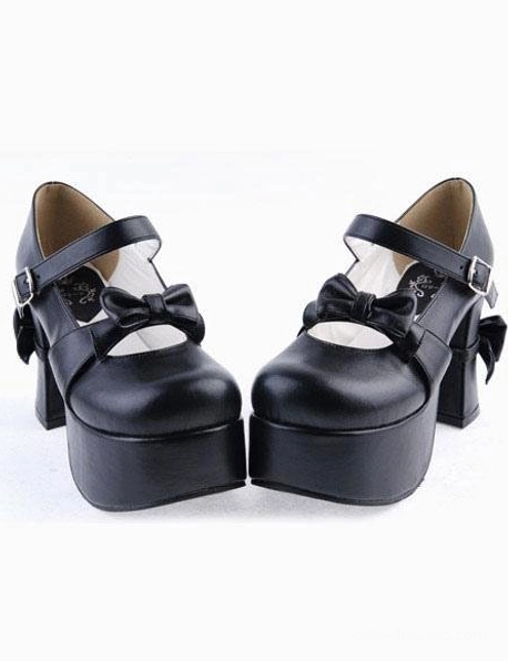 Angled side view of black lolita Mary Jane platform heels showcasing adjustable ankle strap and chunky block heel construction