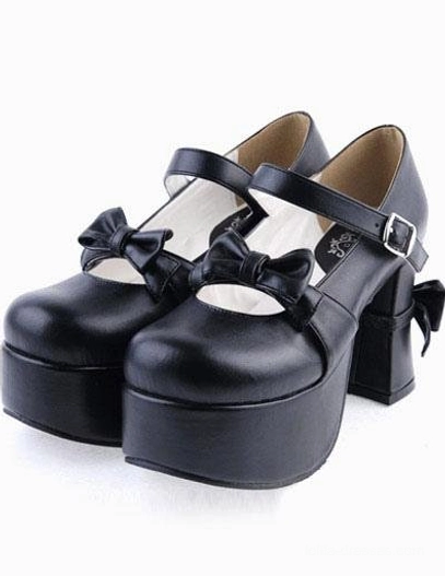 Black matte lolita Mary Jane platform heels with decorative bow and ankle strap buckle shown from side-front angle displaying both shoes