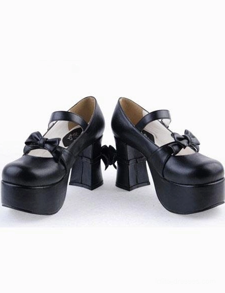 Side-rear double-shoe display of black matte lolita Mary Jane platform heels highlighting thick block heel ankle strap