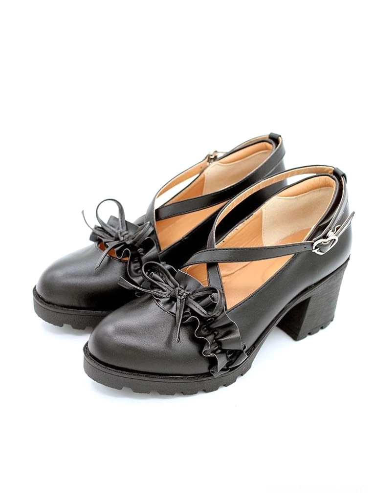 Black matte Lolita leather shoes front flat lay view on plain white background without model, cross strap ruffle bow design, chunky block heel clearly visible
