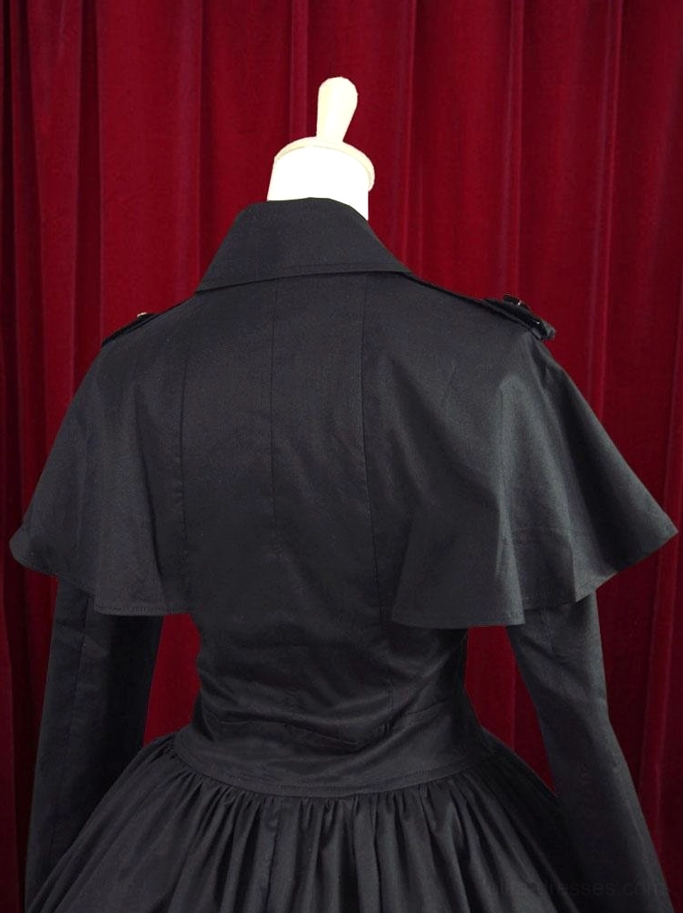 Black military lolita dress back view showing capelet tailored waist and long sleeves on mannequin