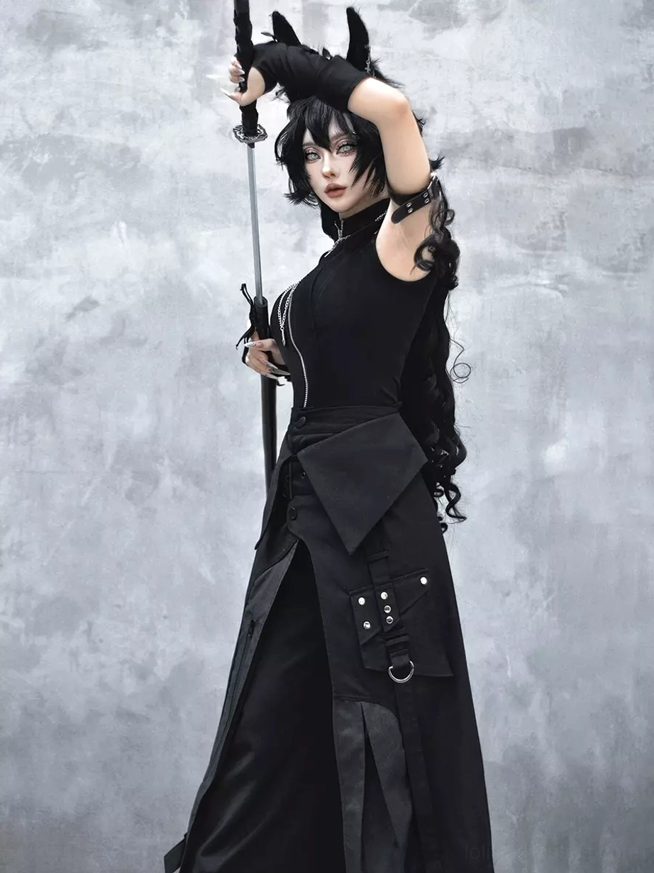 Black gothic punk Ouji Lolita outfit back three-quarter view displaying asymmetrical detachable skirt overlay and sleeveless top