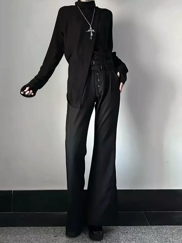 Black ouji lolita high-waist belted wide-leg flare trousers front full-body view with double buckle waist and button closure, styled with black turtleneck top and cross pendant necklace