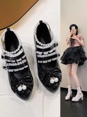 Black patent leather sweet lolita chunky block heel pointed toe shoes with white ruffle ankle straps pearl trim and heart-shaped buckle bow charm detail flat lay and on-foot styling