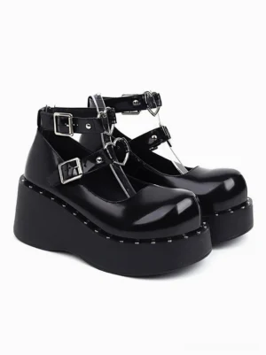 Black patent leather wedge heel academic lolita shoes three-quarter front paired view with dual ankle buckles and studded platform