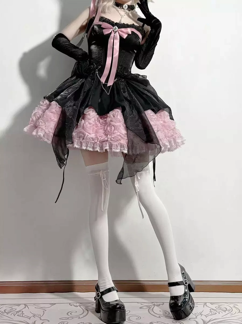 Black pink fairy lolita slip dress side profile view showing fitted bodice construction, high-low tulle skirt layers, platform heels, and dramatic silhouette from side angle