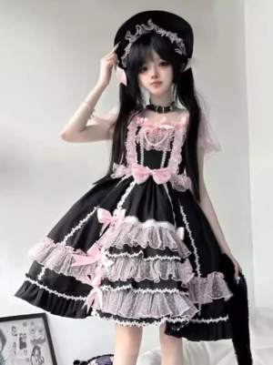 Black sweet lolita short puff sleeve dress with pink ruffles and satin bows front full body view