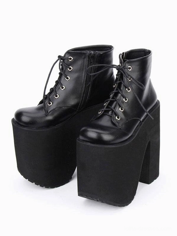 Black platform ankle boots three-quarter side view side zipper metal lace eyelets ultra chunky platform heel gothic lolita style