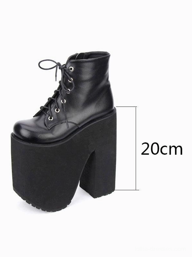 Single black platform ankle boot side profile view 20cm heel height marker chunky block heel lace-up design gothic aesthetic