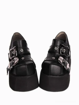 Paired black platform punk lolita shoes side view showing metal grommets adjustable buckle straps thick sole