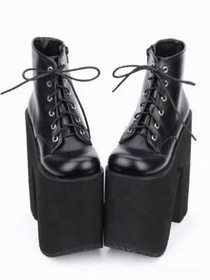 Black platform lolita ankle booties front flat lay view glossy leather lace-up closure with metal eyelets chunky block heel 7.9 inches