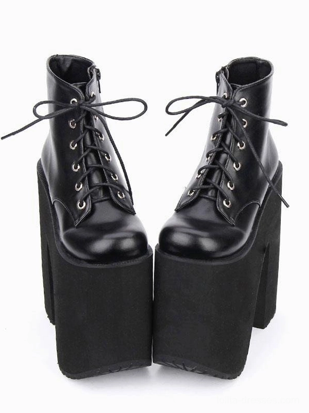 Black platform lolita ankle booties front flat lay view glossy leather lace-up closure with metal eyelets chunky block heel 7.9 inches