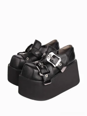 Black platform wedge lolita shoes with metal grommets and dual buckle straps top three-quarter view studio shot