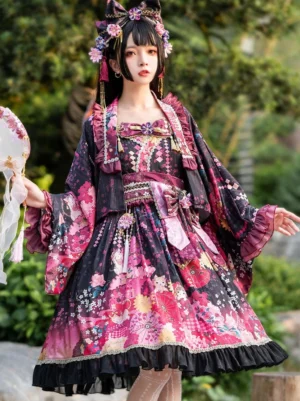 Black floral kimono lolita dress set with red accents, ruffled hem, and matching hair ornaments, full-body front view in outdoor greenery setting