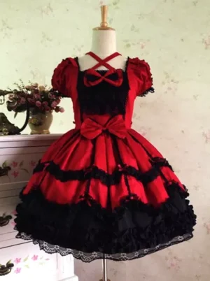 Black and red rococo lolita jumper skirt with halter neckline and lace-trimmed ruffled hem front view