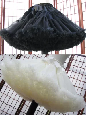 Black ruffled tulle lolita petticoat unboned petticoat overhead front view showing layered fluffy hem and satin waist decoration