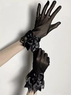 Black sheer gothic lolita gloves with floral lace cuff and satin bow detail, top-down view showcasing full finger coverage and wrist embellishment