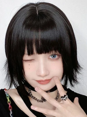 Black short bob lolita wig with blunt straight bangs worn by model in dark gothic outfit, front close-up portrait showcasing authentic lolita hairstyle aesthetic