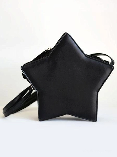 Black star-shaped lolita crossbody bag front eye-level view with solid matte leather exterior attached adjustable shoulder strap displayed on plain white background
