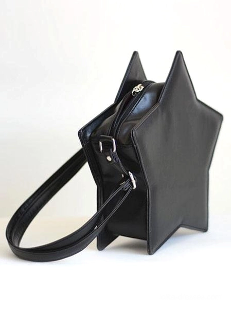 Black star-shaped lolita crossbody bag three-quarter side-back view showing exposed central zipper compartment adjustable leather strap on white background