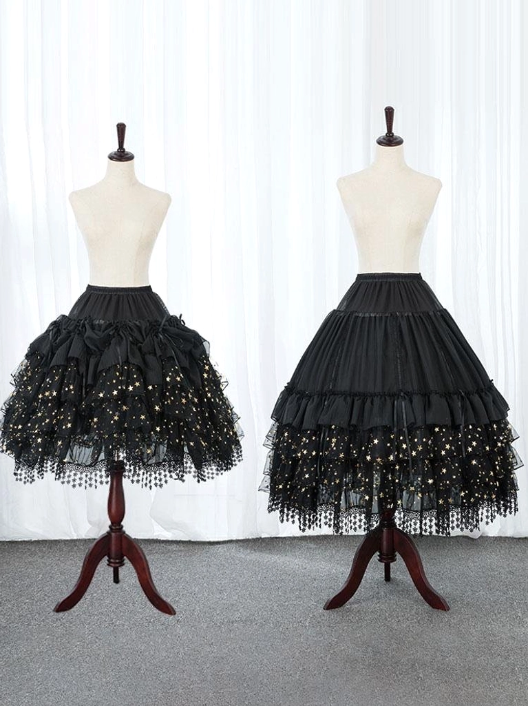 Black star print Lolita petticoat front view showing multiple ruffled tiers with gold star pattern tulle and tassel lace hem trim