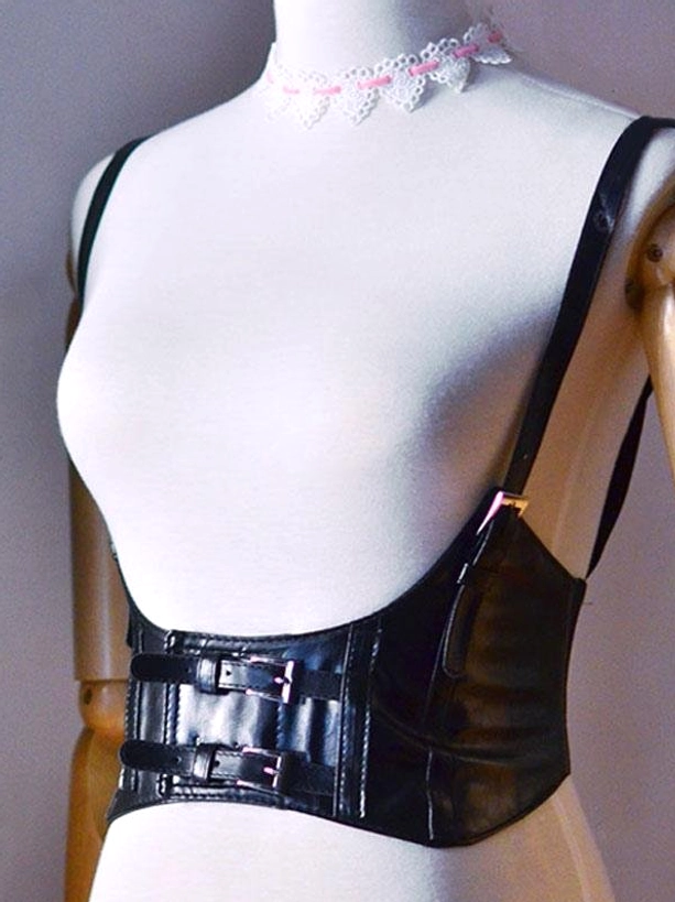Black steampunk lolita PU leather corset bustier with dual metallic front buckles and smooth leather finish, front view