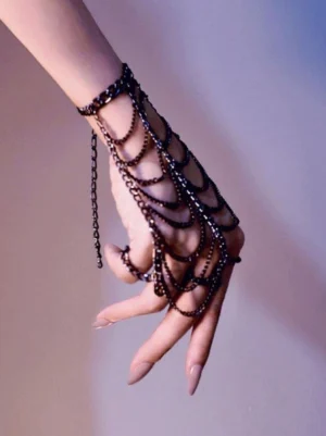 Black alloy hand chain with dangling layers side angle view steampunk gothic lolita jewelry worn on hand