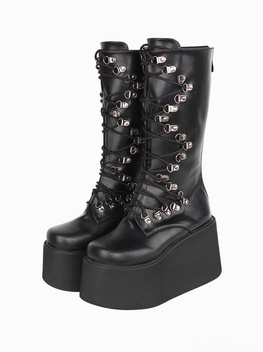 Black steampunk lolita platform boots front three-quarter paired view with round toe silver metal eyelets and thick flatform sole