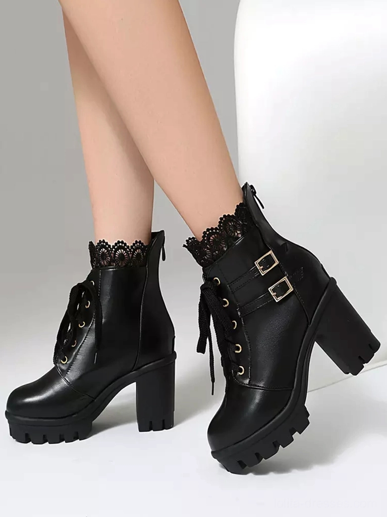 Black Lolita PU leather ankle boots front oblique worn feet view with chunky platform sole lace-up and double buckles