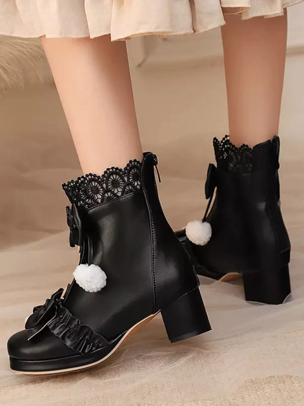 Black Sweet Lolita ankle boots side standalone double shoe view paired with ruffle skirt, displaying lace collar, pom-pom trim and chunky block heel design