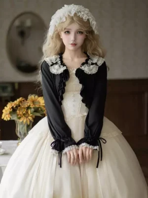 Black lace doll collar cropped cardigan sweet lolita shrug with white lace detailing and drawstring bell sleeves worn on model three-quarter front view