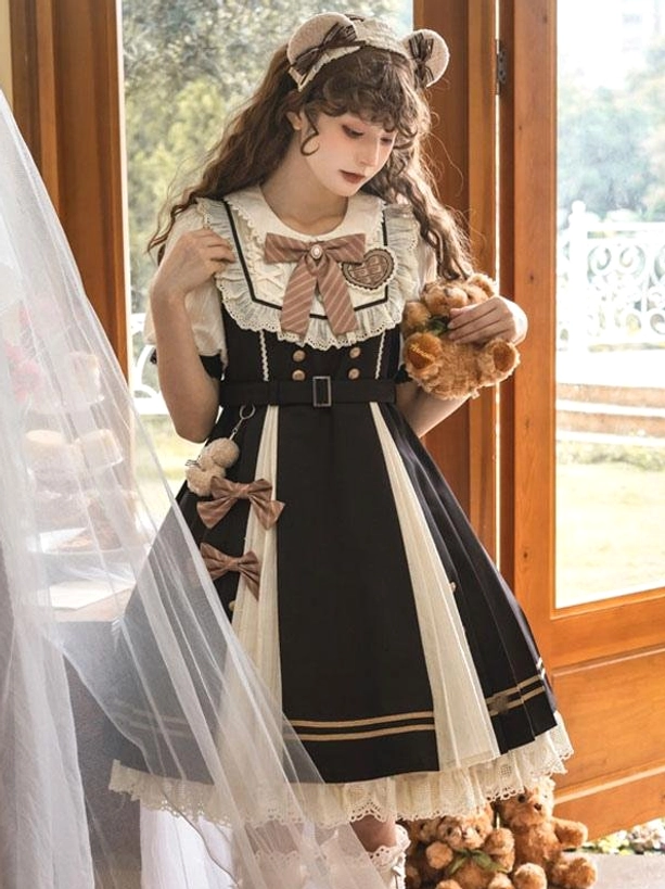 Sweet Lolita dress worn with teddy bear pendant and held baked bread prop in indoor room with garden view background