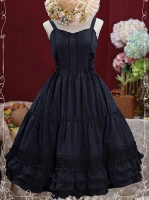 black lolita dress with heart camisole and multi-layered ruffled hem lace-up front detail