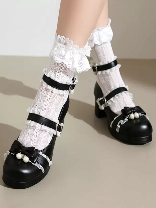 Black Sweet Lolita Mary Jane pumps with adjustable pearl bow buckle straps and chunky block heel, side profile view of model wearing white frilly lace socks
