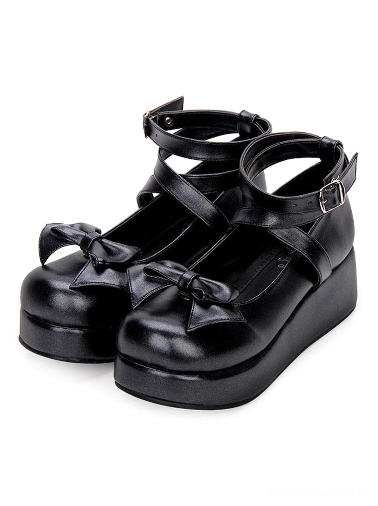 Black Sweet Lolita platform pumps with bow embellishment and dual crisscross ankle straps, three-quarter side view showing toe bow detail and thick platform sole on white background