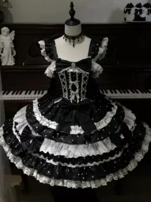 Black sweet lolita princess gown front view with double bows polka dot pattern and ruffled lace detailing