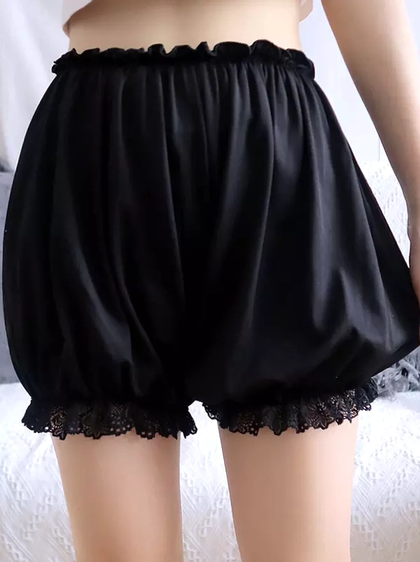 Black lolita pumpkin bloomers back view featuring black lace hem trim satin-like fabric and ruched elastic waistband