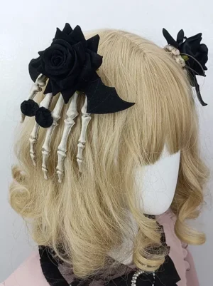 Black velvet rose gothic lolita hair clip featuring skeleton hand details and bat wing design on blonde curly wig with lolita collar from back three-quarter angle