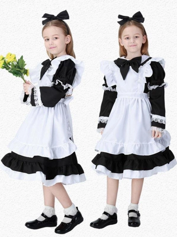 Black and white classic maid lolita op dress with contrast sleeves, layered ruffled hem, lace trim details and bow necktie shown on two child models, one holding decorative flowers