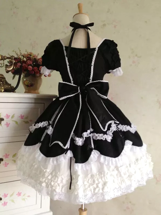 Black and white rococo lolita dress back view halter neck strap large back bow lace trim layered skirt