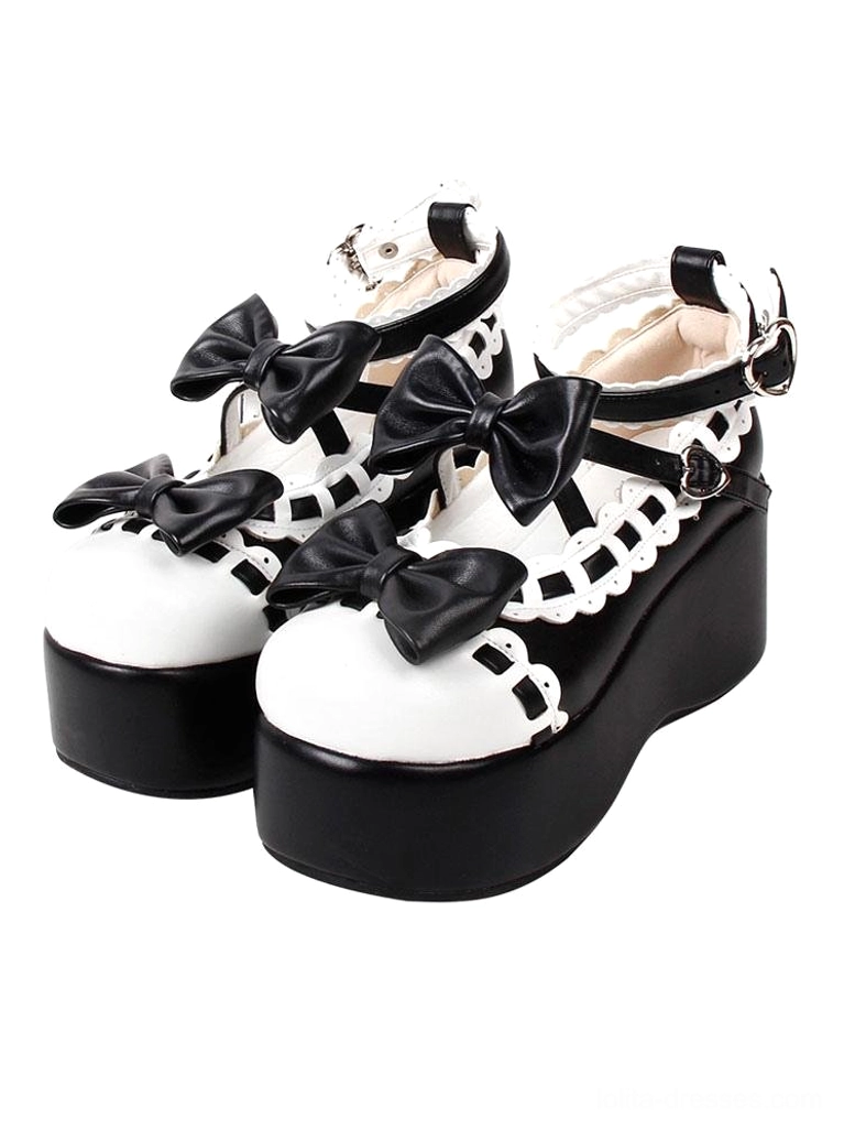 Black and white sweet lolita platform shoes overhead view with bow decorations lace trim and ankle buckle strap